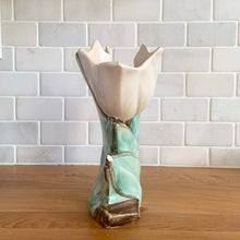 Load image into Gallery viewer, Rare vintage mid-century matte white double tulip vase. Crafted by McCoy Pottery, USA, 1948. This special piece is must for any art pottery collector!

In as found condition, with chip to leaf, no cracks/repairs. Maker&#39;s mark.

Measures 7 x 3 5/8 x 8 inches
