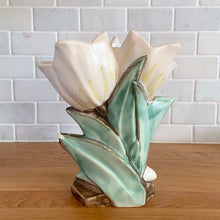 Load image into Gallery viewer, Rare vintage mid-century matte white double tulip vase. Crafted by McCoy Pottery, USA, 1948. This special piece is must for any art pottery collector!

In as found condition, with chip to leaf, no cracks/repairs. Maker&#39;s mark.

Measures 7 x 3 5/8 x 8 inches
