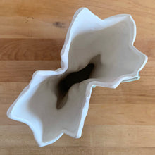 Load image into Gallery viewer, Rare vintage mid-century matte white double tulip vase. Crafted by McCoy Pottery, USA, 1948. This special piece is must for any art pottery collector!

In as found condition, with chip to leaf, no cracks/repairs. Maker&#39;s mark.

Measures 7 x 3 5/8 x 8 inches
