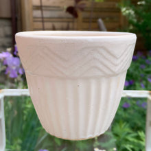 Load image into Gallery viewer, Vintage white matte glaze ceramic jardiniere planter featuring ribbed body with chevron band at the rim. Crafted by Robinson Ransbottom Pottery Co., 1950s. A beautiful piece to add to your art pottery collection and rehome your favourite plant!

In vintage condition, no chips/cracks/repairs. Age-related crazing. Typical manufacturer&#39;s glaze pops and defects. Maker&#39;s marks.

Measures 6 x 5 inches
