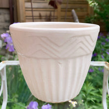 Load image into Gallery viewer, Vintage white matte glaze ceramic jardiniere planter featuring ribbed body with chevron band at the rim. Crafted by Robinson Ransbottom Pottery Co., 1950s. A beautiful piece to add to your art pottery collection and rehome your favourite plant!

In vintage condition, no chips/cracks/repairs. Age-related crazing. Typical manufacturer&#39;s glaze pops and defects. Maker&#39;s marks.

Measures 6 x 5 inches
