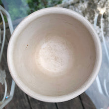 Load image into Gallery viewer, Vintage white matte glaze ceramic jardiniere planter featuring ribbed body with chevron band at the rim. Crafted by Robinson Ransbottom Pottery Co., 1950s. A beautiful piece to add to your art pottery collection and rehome your favourite plant!

In vintage condition, no chips/cracks/repairs. Age-related crazing. Typical manufacturer&#39;s glaze pops and defects. Maker&#39;s marks.

Measures 6 x 5 inches
