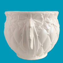 Load image into Gallery viewer, Large vintage Tierra Cushion jardiniere planter pot, aqua shiny glaze, features an overlapping floral leaf pattern around the top rim, a diamond quilted body and ribbon handles. Crafted by McCoy Pottery, USA, 1950s. A must-have for any McCoy collector or gardener!

In good vintage condition, free from chips, cracks or repairs, with crazing commensurate with age, see photos. Maker's mark is on the bottom.

Measures 8 3/4 x 7 1/2 inches
