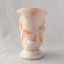 Load image into Gallery viewer, Vintage orange and white slag glass urn with embossed flower. Produced by Akro Agate, circa 1940s. These were produced for Jean Vivaudou Co. as packaging for their sachet products. Use as a bud vase or planter or repurpose to hold make-up brushes or pens/pencils.  In good vintage condition, with minor chips to the rim. Marked &quot;Made in the USA&quot;.   Measures 4 3/4 x 3 x 4 3/8 inches
