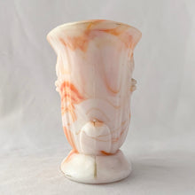 Load image into Gallery viewer, Vintage orange and white slag glass urn with embossed flower. Produced by Akro Agate, circa 1940s. These were produced for Jean Vivaudou Co. as packaging for their sachet products. Use as a bud vase or planter or repurpose to hold make-up brushes or pens/pencils.  In good vintage condition, with minor chips to the rim. Marked &quot;Made in the USA&quot;.   Measures 4 3/4 x 3 x 4 3/8 inches
