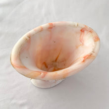 Load image into Gallery viewer, Vintage orange and white slag glass urn with embossed flower. Produced by Akro Agate, circa 1940s. These were produced for Jean Vivaudou Co. as packaging for their sachet products. Use as a bud vase or planter or repurpose to hold make-up brushes or pens/pencils.  In good vintage condition, with minor chips to the rim. Marked &quot;Made in the USA&quot;.   Measures 4 3/4 x 3 x 4 3/8 inches
