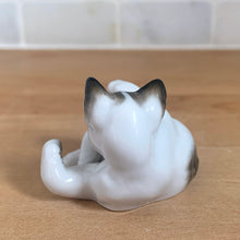 Load image into Gallery viewer, Delightful vintage playful cat porcelain figurine, style 0132 from the Classic Rose Collection. Crafted by Rosenthal, Germany. Add this sweet figurine to your collection!

In excellent condition, no chips/cracks.

Measures 2 1/4 x 2 x 1 1/2 inches
