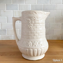 Load image into Gallery viewer, Antique vintage art deco matte white Rosella no. 320 ceramic yellow ware pitcher featuring climbing roses on a basketweave pattern. Crafted by Robinson Ransbottom Pottery Co., USA, 1920s. A beautiful piece of art pottery to add to collection. Makes a wonderful vessel for a floral arrangement.

Option 1: 6 1/2 x 7 5/8 inches
In excellent vintage condition, no chips/cracks/repairs, age-related crazing and typical manufacturing glaze pops. Maker&#39;s mark.

