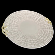 Load image into Gallery viewer, Belleek Tridacna handled cake plate, three-quarter view showing depth of raised shell pattern and yellow figural coral handles, vintage Irish porcelain
