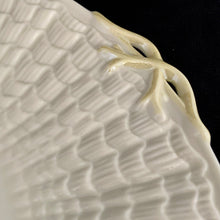Load image into Gallery viewer, Belleek Tridacna cake plate, close-up of cream figural coral handle with looped form and radiating raised shell pattern, vintage Irish porcelain
