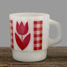 Load image into Gallery viewer, Vintage milk glass mug with vibrant red tulip flowers and gingham check bands. Crafted by Termoscrisa Glass, Mexico. Circa 1980s. Perfect for your cuppa Joe!  In excellent condition, no chips/wear.  Measures 3 x 3 3/8 inches. Capacity 8 ounces
