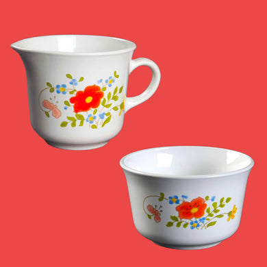 Vintage Corelle Wildflower creamer and sugar. Crafted by Corning, USA, between 1977 - 1986. Brighten up your tableware with this pretty pair!  In excellent condition, free from chips.  Creamer measures 3 1/2 x 3 inches  Sugar  measures 3 7/8 x 2 1/2 inches Jacks Daughter of All Trades Vintage Antique Retro Mid-Century Modern Kitsch Store Shop Reseller Etsy Shopify Toronto Canada Free Porch Pick Up Local Delivery Worldwide Shipping Judy Weinberg Unique Housewarming Hostess Sustainable Gift