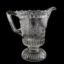 Load image into Gallery viewer, Antique Adams &amp; Co. EAPG Wildflower #140 footed creamer pitcher, front view showing clear pressed glass with raised wildflower and leaf pattern, diamond band at shoulder, and ribbed foot, USA, c.1880
