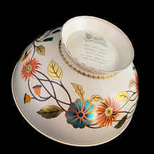 Load image into Gallery viewer, Vintage Wildwood footed metal bowl, shape 64/CD18 features a lovely patten of florals in tea, orange, brown and gold on a cream ground. Crafted by Baret Ware Bowls, England, 1960s. A lovely decorative to use as a catchall, fruit display or decor.

In vintage condition with patina and wear commensurate with age, minor rust under the rolled rim.

Measures 7 1/4 x 3 3/8 inches
