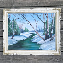 Load image into Gallery viewer, Skillfully hand-painted vintage original oil on board of a river in winter landscape. Signed by Canadian artist, Maybelle May, January 1972. This one-of-a-kind piece will add an exquisite touch of artistry to your home decor. Measures 18 x 14 inch board Framed size 20 3/4 x 16 3/4 inches
