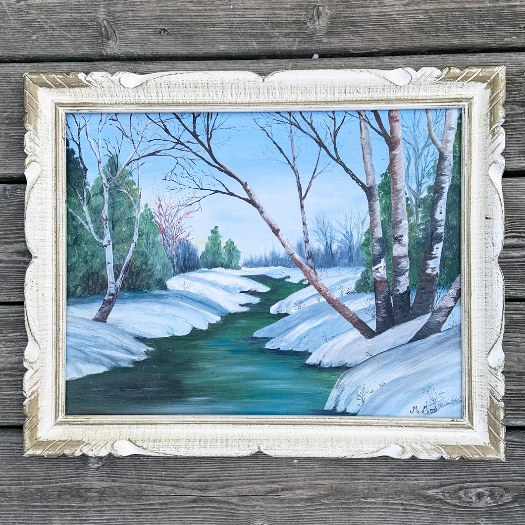 Skillfully hand-painted vintage original oil on board of a river in winter landscape. Signed by Canadian artist, Maybelle May, January 1972. This one-of-a-kind piece will add an exquisite touch of artistry to your home decor. Measures 18 x 14 inch board Framed size 20 3/4 x 16 3/4 inches