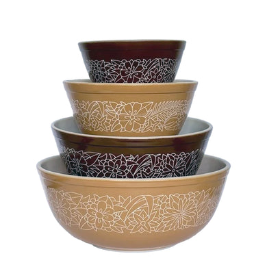 Vintage set of PYREX milk glass mixing bowls in the Woodland pattern, alternating dark brown and tax with a graphic floral pattern in white. Oven and microwave safe; great for serving and food storage. Produced by Corning, NY, USA between 1978 - 1985. A classic kitchen staple for any cook or baker!

401 - 750ml; 5 1/2 inches

402 - 1.5 litres; 7 inches

403 - 2.5 litres; 8 1/2 inches

404 - 4 litres, 10 1/2 inches

All pieces are in excellent condition, no chips.