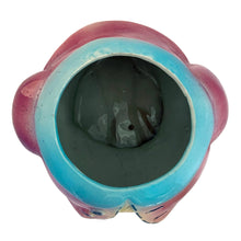 Load image into Gallery viewer, Vintage mid-century hand painted figural chick ceramic cookie jar, hand painted in shades of yellow, wearing a pink and blue jacket with black stitching and topped with a blue and pink beret. Crafted by American Bisque, USA, circa 1950s. Add some kitsch to your kitchen decor with this adorable collectible!

In excellent condition, minor chip on the underside of the foot, no cracks, age-related crazing.

Measures 6 x 7 x 11 3/4 inches
