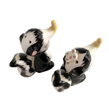 Load image into Gallery viewer, Vintage hand painted yellow clothespinned nose skunk salt and pepper shakers with cork stoppers. Norcrest, Japan, 1950s. Add these adorable kitschy shakers to your collection!

In excellent condition, no chips/cracks/repairs. Marked Japan.

Measures 2 1/4 x 1 1/8 x 2 5/8 inches
