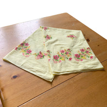 Load image into Gallery viewer, Add some vintage charm to your tablescape with this yellow cotton rectangular tablecloth featuring sprays of flowers in shades of pink, yellow, orange and green. Perfect for adding a hint of nostalgia to any gathering!  In excellent condition, free from stains/tears.  Measures 53 x 41 inches
