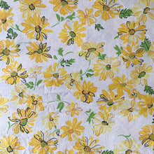 Load image into Gallery viewer, Vintage yellow daisy flat double Muslin cotton bed sheet featuring a pattern of yellow daisy flowers accented with black and green on white ground. Crafted by Dan River, USA, 1970s. A beautiful addition to your retro bedding decor. Easily repurpose for crafting, quilting or dressmaking.

In excellent vintage condition, no stains/tears.

Measures 81 x 108 inches
