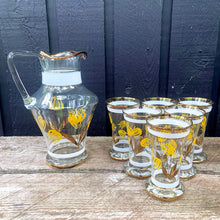 Load image into Gallery viewer, Jacks Daughter of All Trades Vintage Antique Mid-Century Kitsch Store Shop Reseller Etsy Shopify Toronto Canada Free Porch Pick Up Local Delivery Worldwide Shipping Judy Weinberg Unique Housewarming Gift Sustainable Gift Wedding Gift Home Decor Collectible Collector Gift Farmhouse Cottagecore Cottage Lodge Shabby Chic art deco blown glass lemonade pitcher glasses set hand painted with yellow flowers gold leaves art glass Romania 1950s tableware drinkware barware beverage
