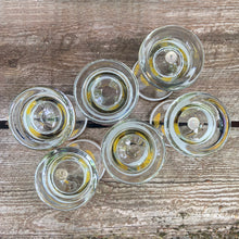 Load image into Gallery viewer, Vintage blown glass lemonade pitcher and glasses set hand painted with yellow flowers with gold leaves, white and gold bands and rims. Crafted in Romania, 1950s. A lovely set to add cheer to your table.

In excellent condition, no chips. Original stickers marked, Made in Roumania.

Pitcher measures 8 1/2 x 11 inches. Capacity 80 ounces

Glasses measure 3 1/2 x 5 7/8 inches. Capacity 16 ounces
