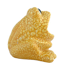 Load image into Gallery viewer, Left-side profile view of vintage yellow lava glaze ceramic frog sponge holder, showing the upward tilt of the open mouth, one bulging eye, and the depth of the hollow cavity
