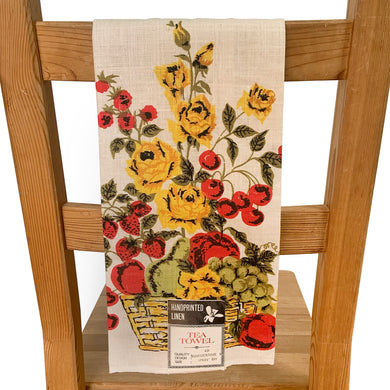 Stunning vintage retro hand printed natural linen tea towel featuring yellow roses and red fruits. An artful addition to your vintage or contemporary kitchen decor.

New old stock with original tag. In excellent condition. Made in Hungary.

Measures 17 x 29 inches
