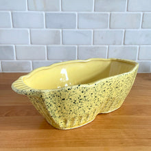 Load image into Gallery viewer, Vintage glossy yellow speckle glazed oval ceramic planter. Crafted by Robinson Ransbottom Pottery Co., USA, 1960s. A unique piece to add to your art pottery collection!

In excellent condition, no chips/cracks/repairs. Maker&#39;s marks.

Measures 11 1/4 x 5 1/2 x 3 1/2 inches

