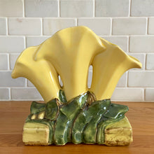 Load image into Gallery viewer, Rare vintage mid-century yellow triple lily vase. Crafted by McCoy Pottery, USA, 1950s. This rare piece is must for any art pottery collector!

In excellent condition, no chips/cracks/repairs. Maker's mark.

Measures 8 1/8 x 3 1/2 x 6 3/4 inches
