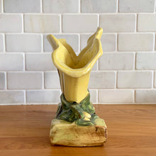 Load image into Gallery viewer, Rare vintage mid-century yellow triple lily vase. Crafted by McCoy Pottery, USA, 1950s. This rare piece is must for any art pottery collector!

In excellent condition, no chips/cracks/repairs. Maker's mark.

Measures 8 1/8 x 3 1/2 x 6 3/4 inches
