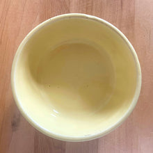 Load image into Gallery viewer, Vintage glossy yellow ceramic bowl with an exterior pattern of horizontal waves. Crafted by Robinson Ransbottom Pottery Co., USA, 1960s. A beautiful piece to add to your art pottery collection!

In excellent condition, no chips/cracks/repairs. Maker&#39;s marks, number 308.

Measures 5 5/8 x 1 7/8 inches

