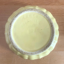 Load image into Gallery viewer, Vintage glossy yellow ceramic bowl with an exterior pattern of horizontal waves. Crafted by Robinson Ransbottom Pottery Co., USA, 1960s. A beautiful piece to add to your art pottery collection!

In excellent condition, no chips/cracks/repairs. Maker&#39;s marks, number 308.

Measures 5 5/8 x 1 7/8 inches
