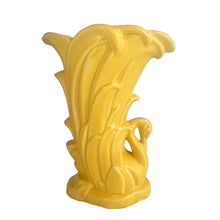 Load image into Gallery viewer, Beautiful vintage gloss yellow Swan vase, features a swan swimming in the reeds. Crafted by McCoy Pottery, 1948. This vase is must for any art pottery collector!

In as found vintage condition, roughness to the rim and minor tight hairline crack, age-related crazing. Maker's mark on the bottom.

Measures 6 7/8 x 4 1/4 x 9 3/8 inches
