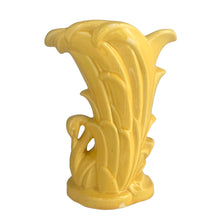 Load image into Gallery viewer, Beautiful vintage gloss yellow Swan vase, features a swan swimming in the reeds. Crafted by McCoy Pottery, 1948. This vase is must for any art pottery collector!

In as found vintage condition, roughness to the rim and minor tight hairline crack, age-related crazing. Maker's mark on the bottom.

Measures 6 7/8 x 4 1/4 x 9 3/8 inches
