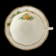 Load image into Gallery viewer, This vintage Tea Rose bone china teacup and saucer is so pretty! Both the Malvern shaped cup and saucer have a lovely scalloped edge with hand painted roses in shades of yellow and green with gold gilt rim. Crafted by Royal Albert, England, circa 1940s. A lovely addition to your teacup collection or to give as a gift!

In excellent condition, free from chips, cracks and repairs. Makers marks present.

Teacup measures 3 1/2 x 2 3/4 inches. Saucer measures 5 5/8 inches
