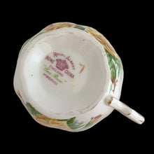 Load image into Gallery viewer, This vintage Tea Rose bone china teacup and saucer is so pretty! Both the Malvern shaped cup and saucer have a lovely scalloped edge with hand painted roses in shades of yellow and green with gold gilt rim. Crafted by Royal Albert, England, circa 1940s. A lovely addition to your teacup collection or to give as a gift!

In excellent condition, free from chips, cracks and repairs. Makers marks present.

Teacup measures 3 1/2 x 2 3/4 inches. Saucer measures 5 5/8 inches
