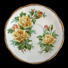 Load image into Gallery viewer, This vintage Tea Rose bone china teacup and saucer is so pretty! Both the Malvern shaped cup and saucer have a lovely scalloped edge with hand painted roses in shades of yellow and green with gold gilt rim. Crafted by Royal Albert, England, circa 1940s. A lovely addition to your teacup collection or to give as a gift!

In excellent condition, free from chips, cracks and repairs. Makers marks present.

Teacup measures 3 1/2 x 2 3/4 inches. Saucer measures 5 5/8 inches
