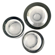 Load image into Gallery viewer, This mid-century vintage cocktail set features two silver-rimmed glasses labeled You and Me in elegant silver script, accompanied by a matching cocktail shaker marked Ours with a chrome lid. Crafted by Queens Lustreware, USA, 1950s. This set makes an ideal gift for weddings or housewarmings, celebrating togetherness with timeless style.

All pieces are in excellent vintage condition.

Shaker measures 2 3/4 x 6 inches. Capacity 12 ounces.

Glasses measure 2 1/2 x 2 3/4 inches. Capacity 4 ounces.
