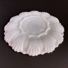Load image into Gallery viewer, vintage milk glass serving platter features a scalloped rim finished in gold gilt,accommodates 12 deviled eggs, with an open middle that’s perfect for a small bowl or salt/pepper shakers. This lovely platter would also be perfect for serving oysters on the half shell with your fave sauce in a small bowl in the middle....just set it on top of a tray or bowl of ice. Excellent condition, free from chips/cracks. Crafted by Anchor Hocking, USA, circa 1950s. Measures 10 x 1 1/4 inches
