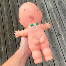 Load image into Gallery viewer, Collectible and kitschy rubber squeaky Kewpie Doll with green wings, jointed head and arms. This delightful little cutie stands at approximately 11&quot; inches tall. Made in Japan.  Excellent great vintage condition.
