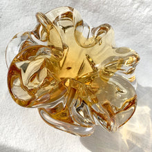 Load image into Gallery viewer, This vintage art glass ashtray is a rare find. Its four-sided yellow and clear design creates a beautiful flower-like bloom effect and is sure to be a standout addition to any vintage art glass collection as a stylish and functional piece.  In excellent condition, free from chips/cracks.  Measures 6 x 3 3/4 inches .
