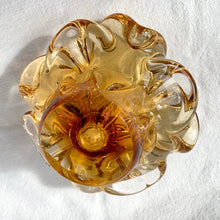 Load image into Gallery viewer, This vintage art glass ashtray is a rare find. Its four-sided yellow and clear design creates a beautiful flower-like bloom effect and is sure to be a standout addition to any vintage art glass collection as a stylish and functional piece.  In excellent condition, free from chips/cracks.  Measures 6 x 3 3/4 inches .
