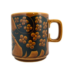 Load image into Gallery viewer, Perfect for your morning cuppa! This fabulous graphic vintage mug was designed by John Clappison and produced by Hornsea in England, circa 1975. The momma, daddy and baby pigs are decorated with dots and flowers....so sweet and highly collectible!  In excellent condition free from chips/cracks.  Measures 3&quot; x 3-1/2&quot;  Capacity 10oz
