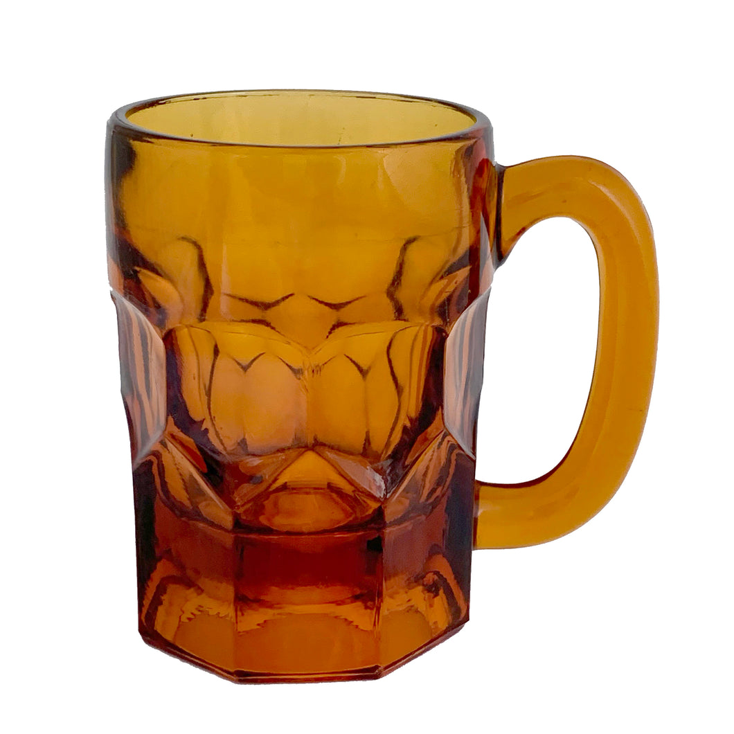 Outstanding heavy amber glass beer mug with a diamond thumbprint design. Holds one pint.  In excellent condition, no chips or cracks.  Measures 3-1/4