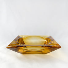 Load image into Gallery viewer, Vintage Retro Mid-century Mid Century Modern Large Square Pressed Glass Amber Gold Honey Amber Yellow Ashtray Anchor Hocking USA Cigarette Cigar Cigarello Joint Blunt Marijuana Home Decor Smoking Smoke Smoker Tobacciana Unique Gift Home Decor Glassware Tableware Freelton Hamilton Antique Mall Toronto Canada shop store community seller reseller vendor
