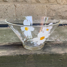 Load image into Gallery viewer, This clear serving bowl is hand painted in white flowers with vibrant yellow centres...so pretty! Whatever you serve in this bowl, you&#39;ll know it&#39;s party time. Made by Anchor Hocking Glass Co. circa 1960s.  In excellent condition, no chips or cracks.  Measures 10-3/4&quot; x 5-7/8&quot;
