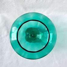 Load image into Gallery viewer, Gorgeous vintage mid-century art glass pedestal bowl in a beautiful shade of teal and the glass has a wave which catches the light. The base is clear and clover shaped, with lovely controlled bubbles. Designed by Bo Bergstöm for Aseda Glass of Sweden.  In excellent condition, no cracks. There is the tiniest flea nick on the inside rim of the bowl which is literally invisible.   Measures 6 x 2 1/2 inches
