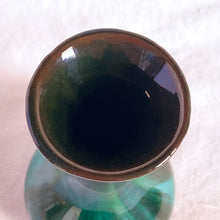Load image into Gallery viewer, The pride of Collingwood, Ontario, Blue Mountain Pottery! This lovely bud vase will compliment and floral bouquet. Typical with BMP pottery, it has a drip glaze finish in deep greens and black.   Excellent condition, no chips or cracks.  Size: 3&quot; x 5.5&quot;
